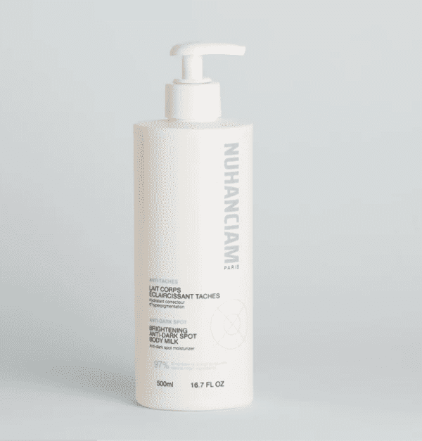 NUHANCIAM Lait Corps Éclaircissant Taches 500 ml, soin éclaircissant et hydratant, disponible en parapharmacie à Kénitra et sur notre parapharmacie en ligne